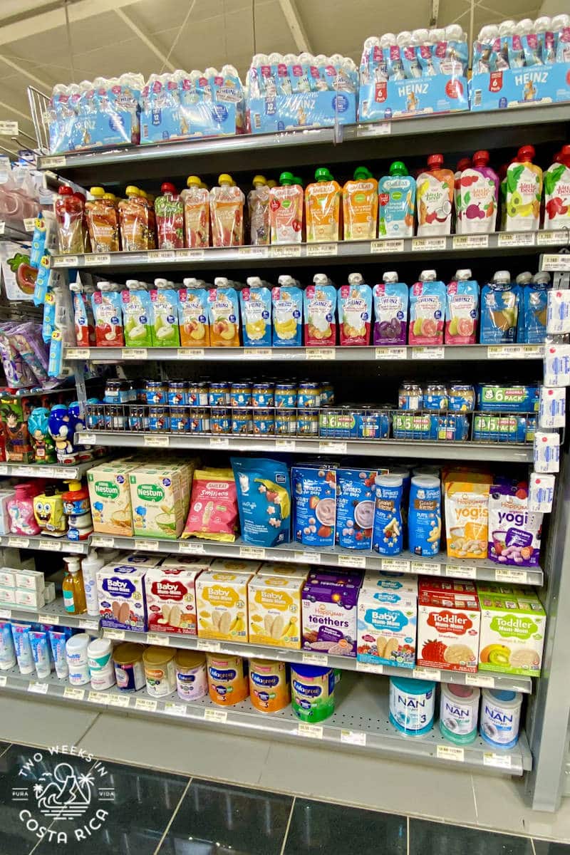baby foods and snacks on display at a grocery store in costa rica