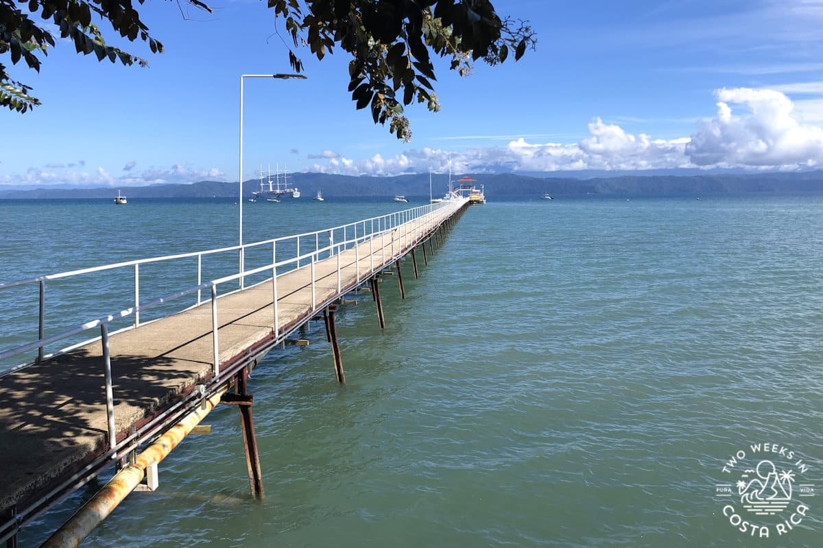 wooden pier over calm ocean water