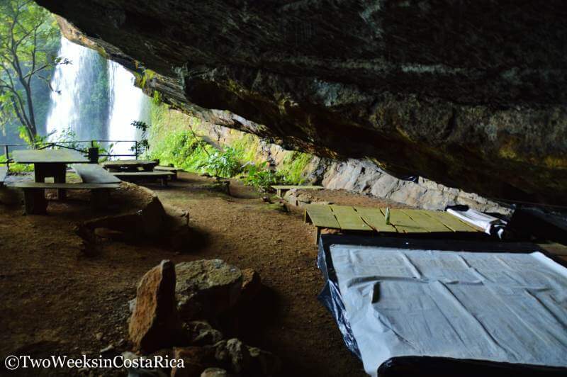 Rustic beds in the cave at Diamante Waterfall near Dominical
