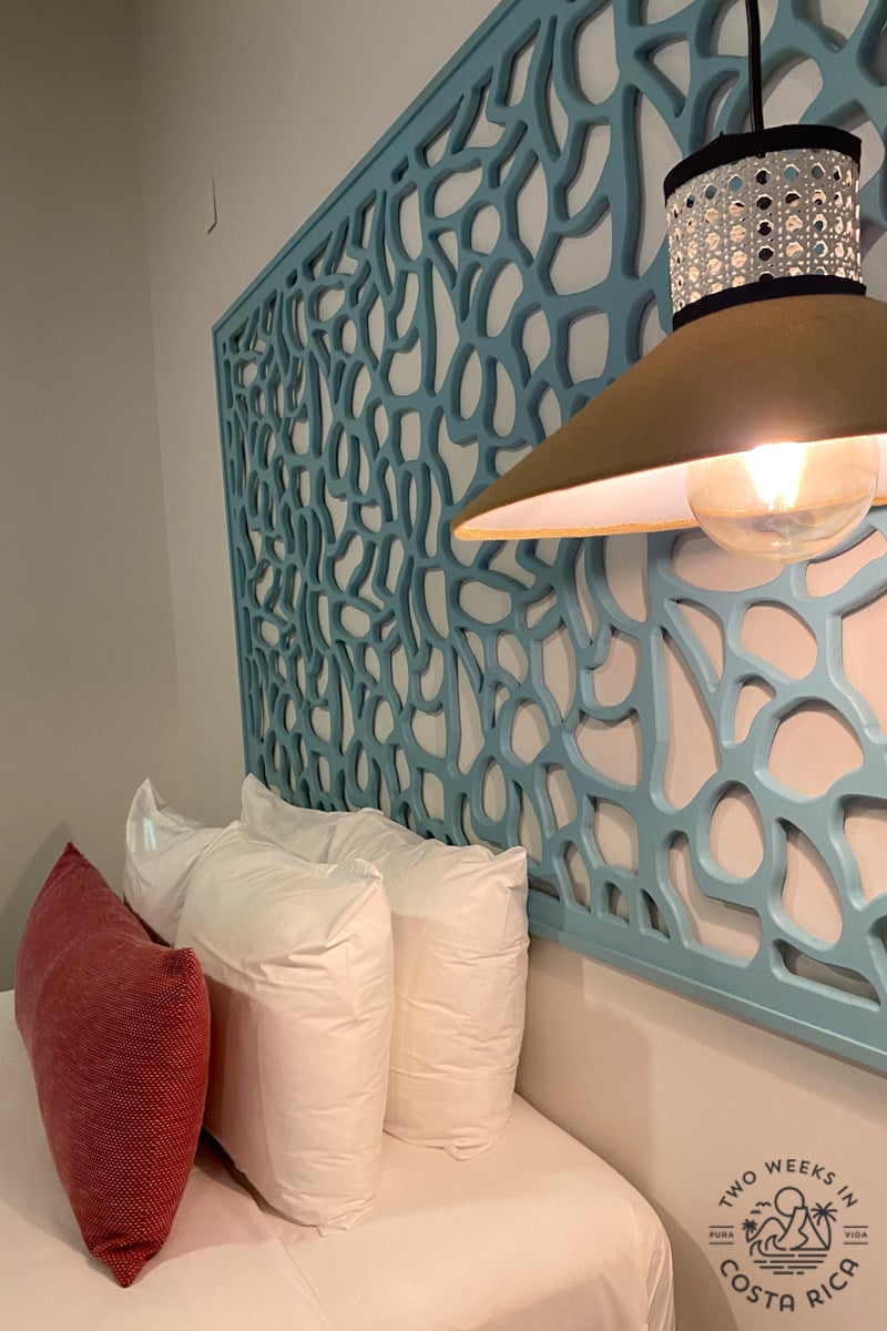 a contemporary bedframe and lamp at hotel cloud forest lodge