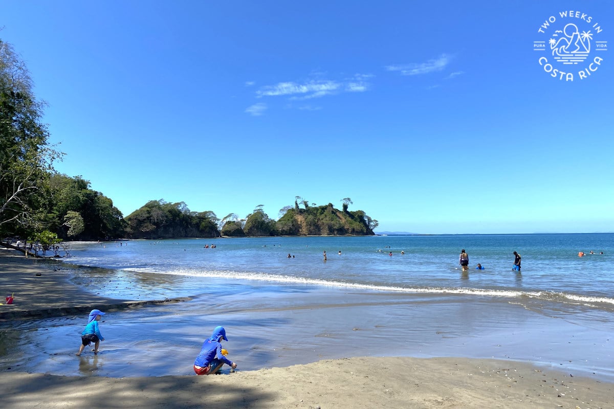 people swimming at playa mantas near jaco costa rica