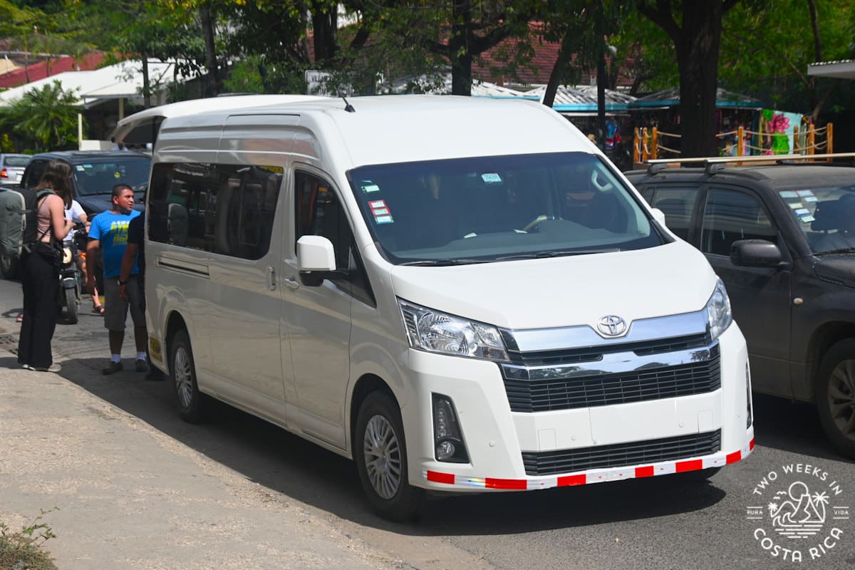 A family loading their luggage into a private shuttle van in Tamarindo Costa Rica