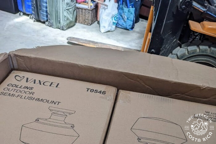 An opened cardboard box with a fork lift in the background