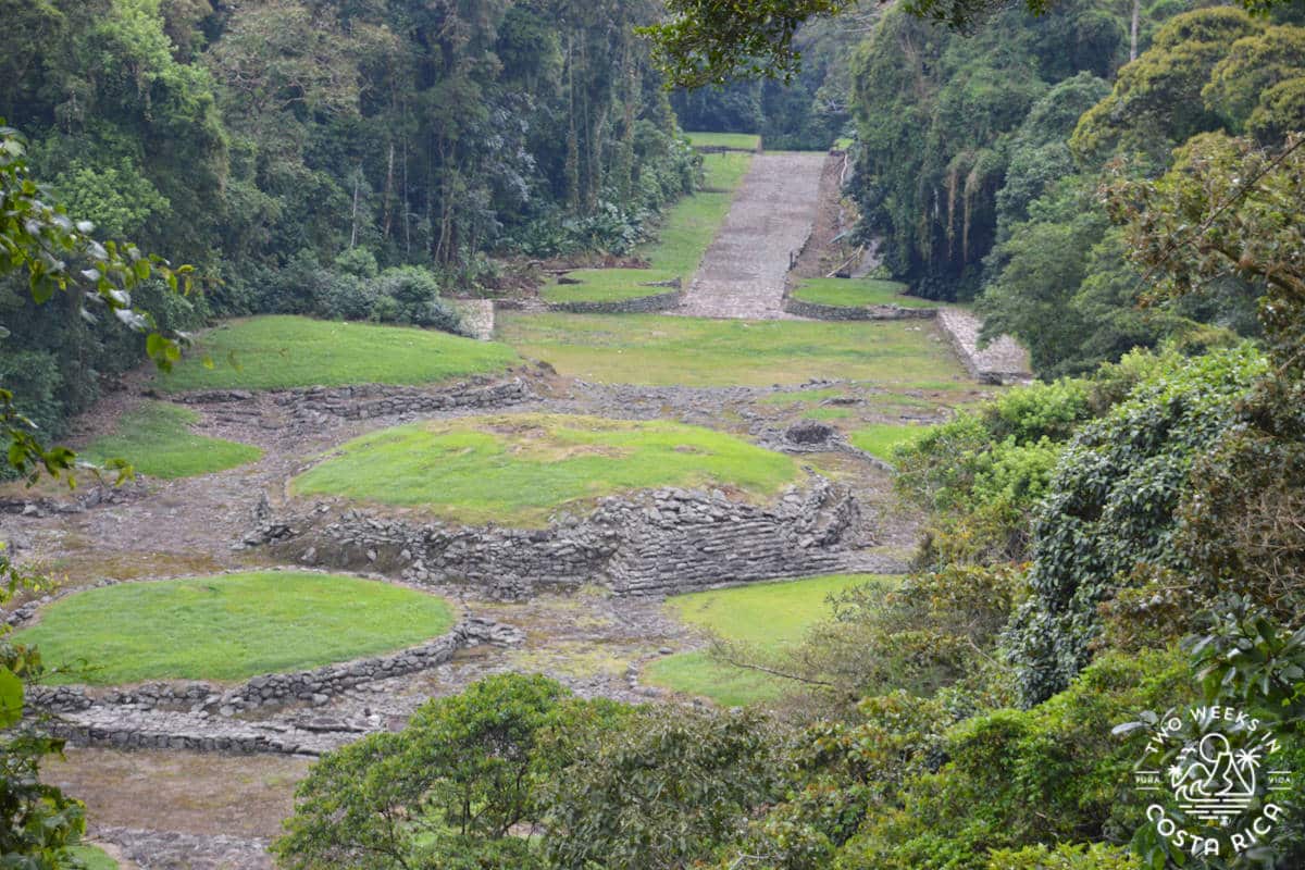 View overlooking the Guayabo Monument Archeological site in Costa Rica with stone infrastructure like roads and foundations