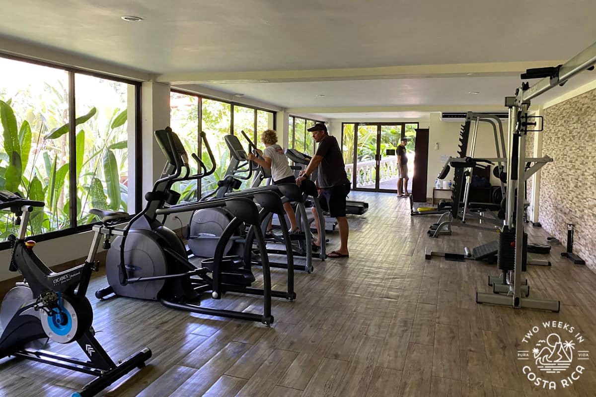 room with fitness equipment like bikes and treadmills