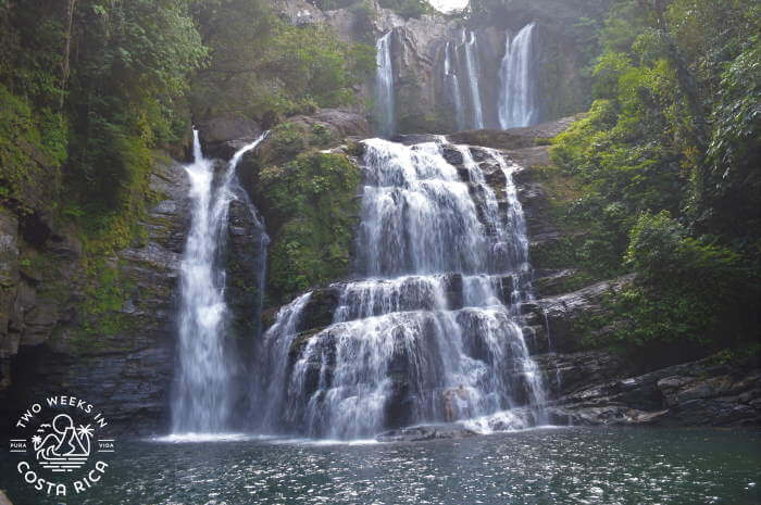 waterfalls spilling down the rocky mountainside
