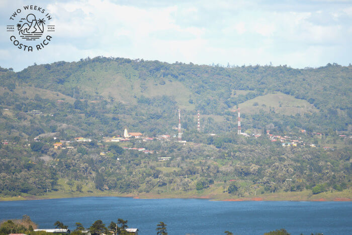view of a Nuevo Arenal town from across the lake