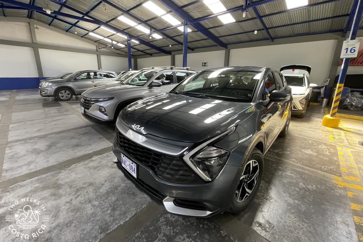 rental cars lined up at an agency near san jose airport in costa rica