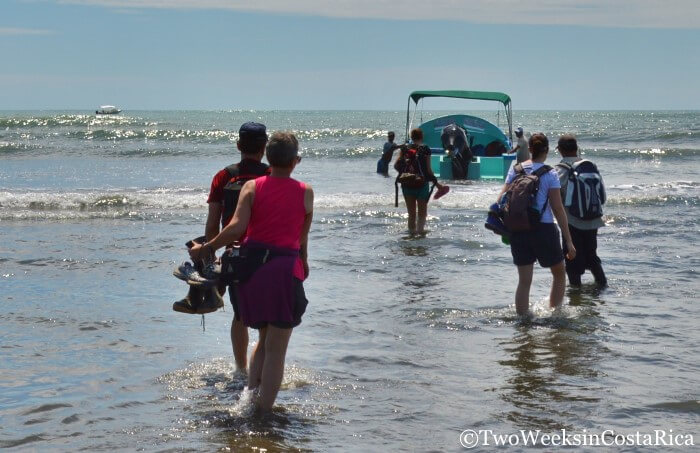 getting onto the boat on the Sirena Ranger Station day trip from Drake Bay 