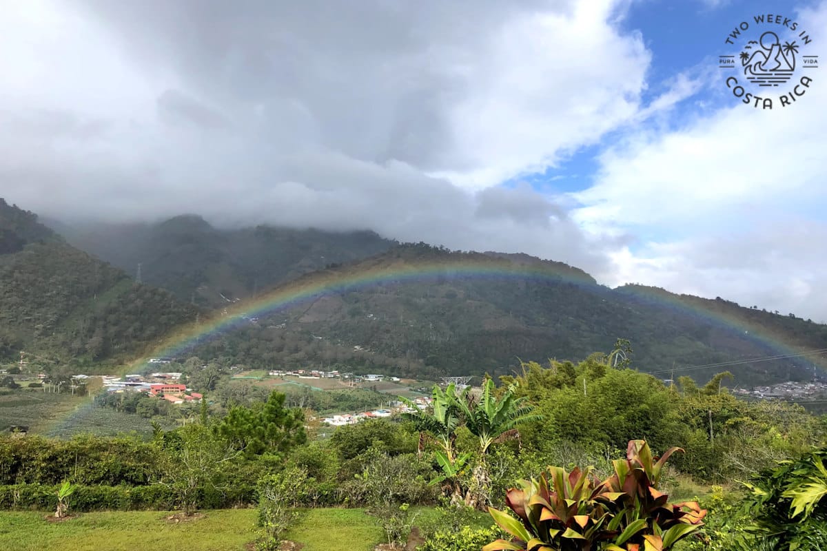 A rainbow over a mountain town
