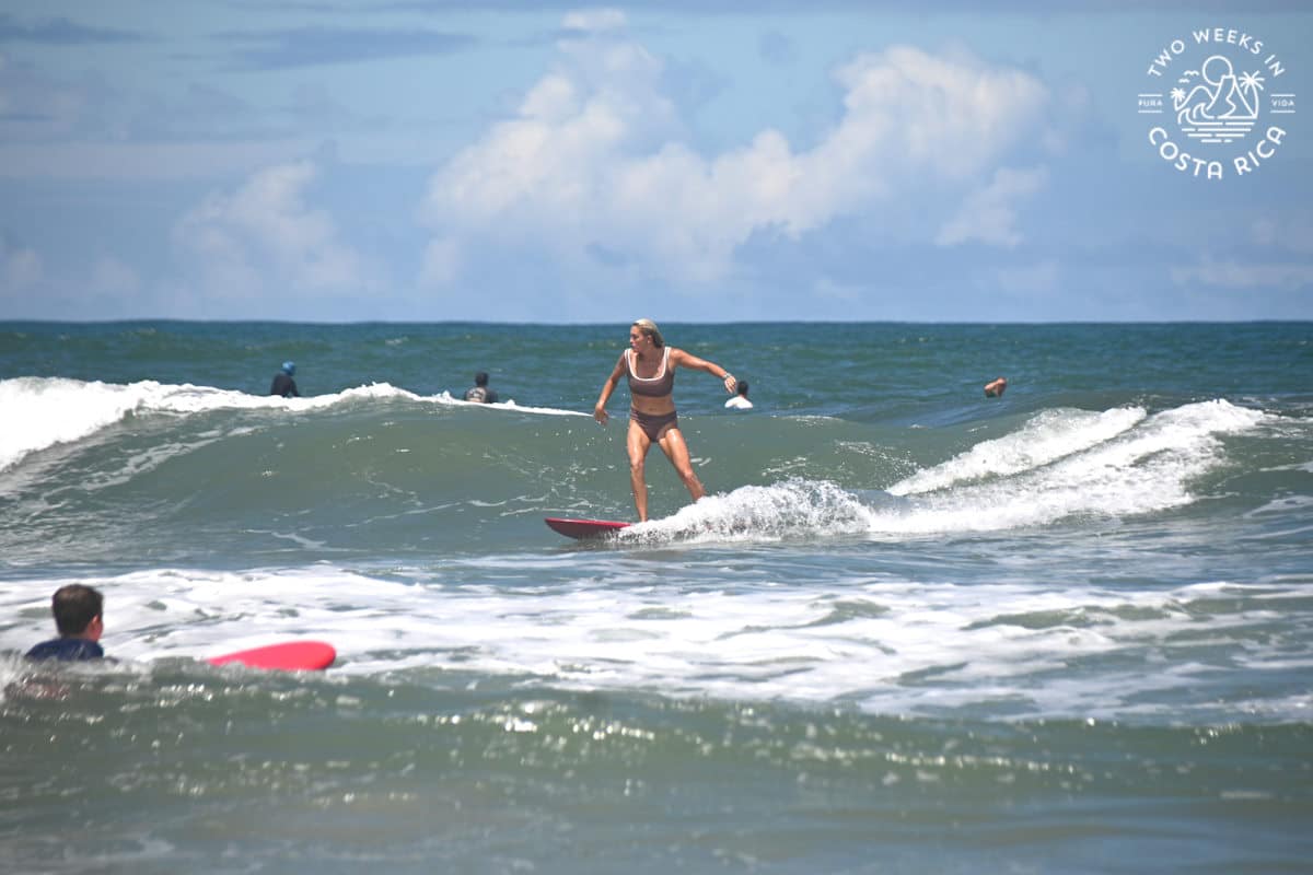 someone surfing in the waves at playa guiones