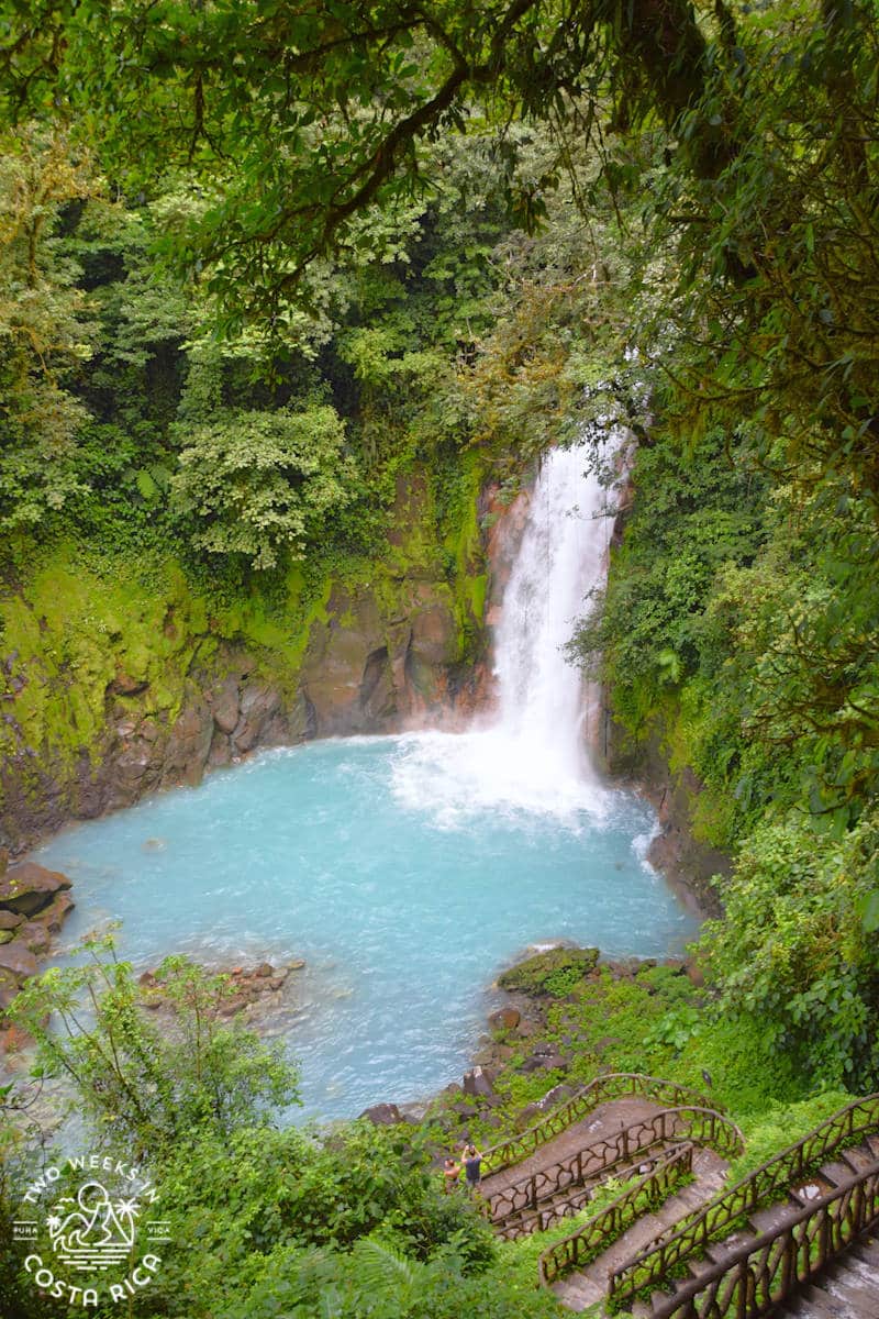 looking from the top of the staircase at rio celeste waterfall in tenorio volcano park