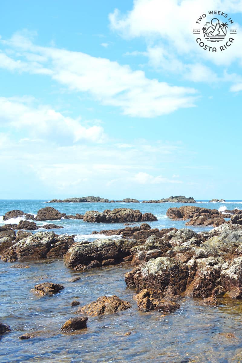 shallow tidepools with blue sky