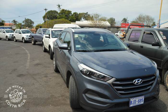 a rental car loading onto the puntarenas ferry